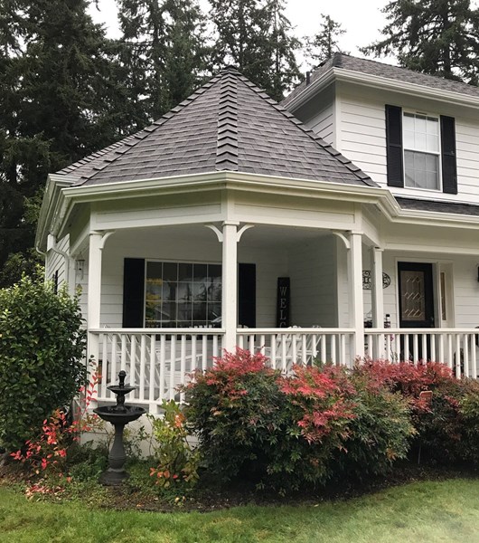 White curved gutters on residential home in Portland, OR