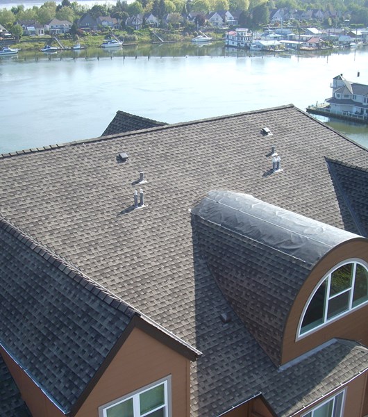 Commercial asphalt roofing on multi-family home in Portland, OR