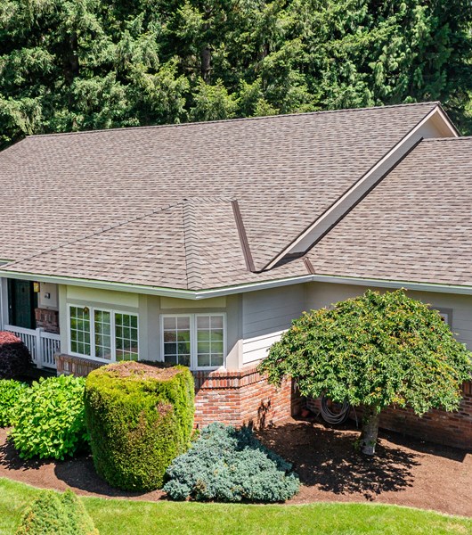 New, brown asphalt roof on one-story residential home in Portland, OR