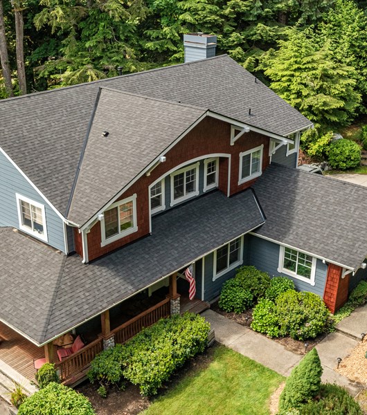 Black composite shingles on big two-story home near Portland, OR