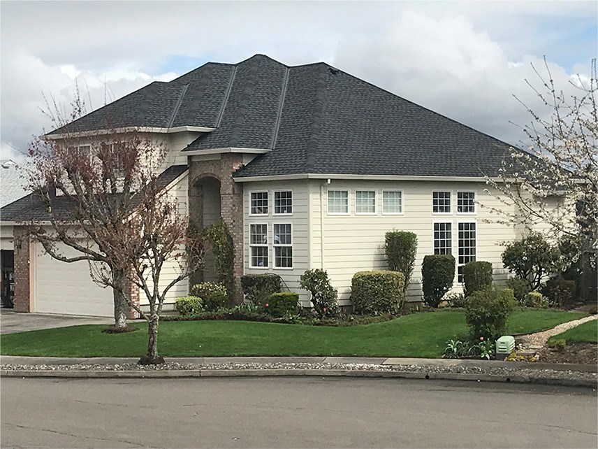 Roof repair on two-story residential home in Portland, OR